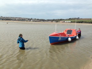 Walking the boat out to deeper water...